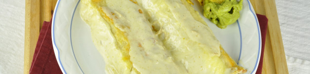Honey Lime Chicken Enchiladas for Cinco de Mayo with a side of chips and guacamole
