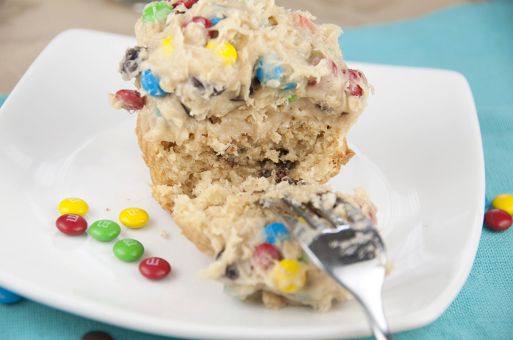 Monster Cookie Dough Cupcakes. Peanut butter cupcakes with monster cookie dough frosting