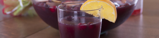 Cranberry Pomegranate Holiday Winter Sangria Recipe made with lemon, orange, and apple. Great for a party!