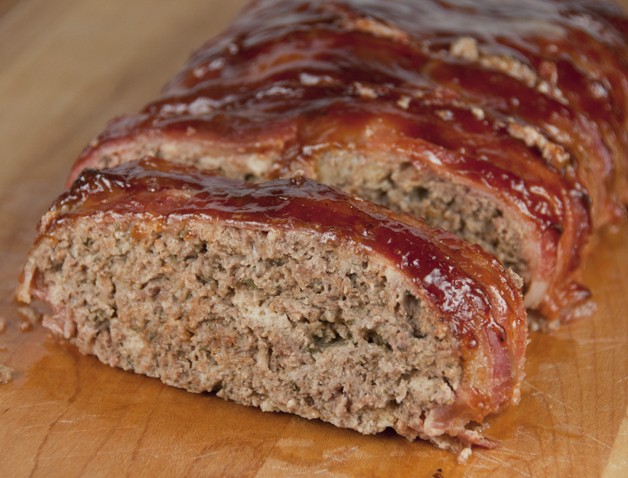 The best meatloaf recipe where the meatloaf is wrapped in bacon and brushed with barbeque sauce