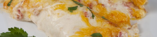 The best Cheesy Sour Cream Chicken Enchiladas Recipe that are great for Mexican food night!