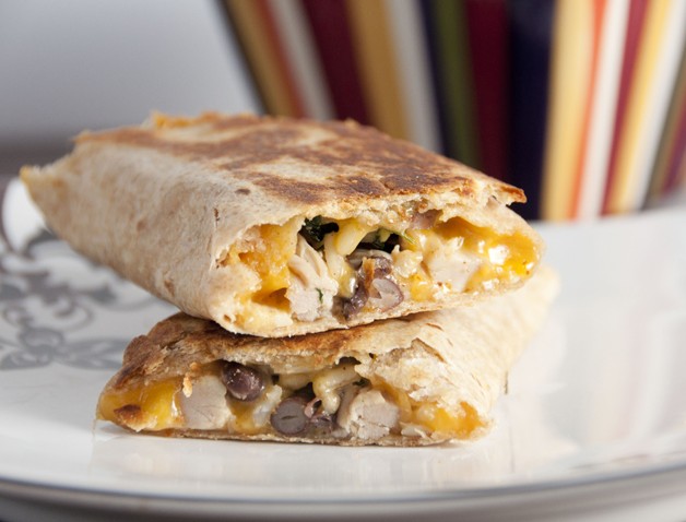 Crispy Southwest Chicken Wraps couldn't be easier to put together and are absolutely delicious with peppers, black beans and cheddar cheese. Great lunch or dinner recipe.