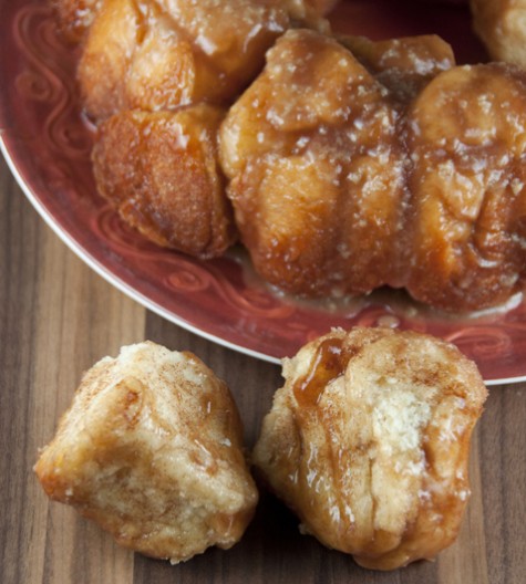 An easy recipe for cinnamon monkey bread. This ooey-gooey bread has cinnamon and is drizzled with a warm maple glaze.