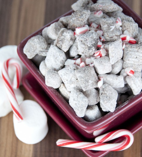 Puppy Chow muddy buddies made with Rice Chex, hot chocolate mix, and melted chocolate for an easy Christmas or cold weather snack!