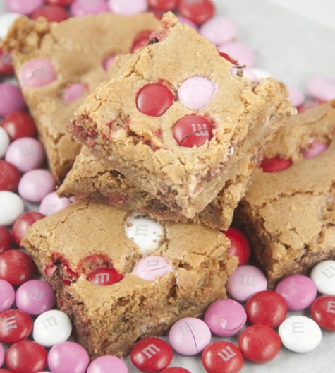 Brown Sugar M&M Blondies are an easy dessert to make for Valentine's day or any occasion. They are, soft, chewy and full of flavor!
