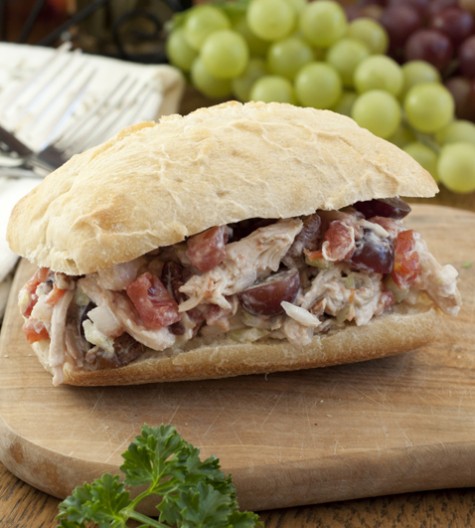 Crunchy pecans, soft tomatoes and green chilies create the perfect texture for this healthy Pecan Grape Chicken Salad recipe with a kick. The combination of pecans and sweet grapes make it a taste sensation for summer lunch or dinner!