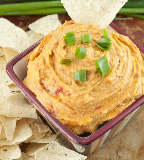 Easy Creamy Red Pepper Cashew Dip recipe is meat and dairy-free, served hot OR cold, and will be a huge hit for your next tailgate or football party this season!