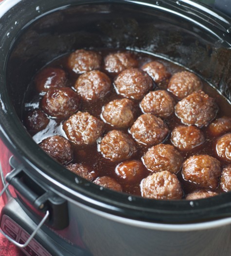 Crock Pot Grape Jelly BBQ Cocktail Meatballs are an awesome recipe for holiday entertaining, Super Bowl party, or pot luck made right in the slow cooker. They are so simple to make and extremely crowd-pleasing!