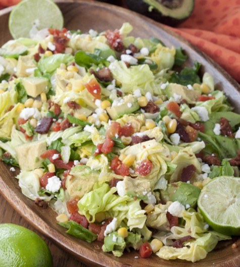 Your favorite sandwich recipe made into a healthy BLT Chopped Salad with Avocado and topped off with a sweet lime vinaigrette dressing!