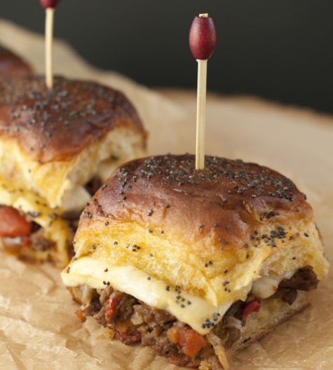 Jalapeño Cheeseburger Party Buns recipe, also knows as "sliders", is a mouth-watering way to feed a crowd quickly and easily with seasoned beef, gooey cheese, and a sweet glaze!