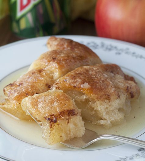 Easy Country Cinnamon Apple Dumplings dessert or breakfast recipe is a classic fall and holiday treat loaded with cinnamon and smothered in a buttery Mountain Dew sauce!