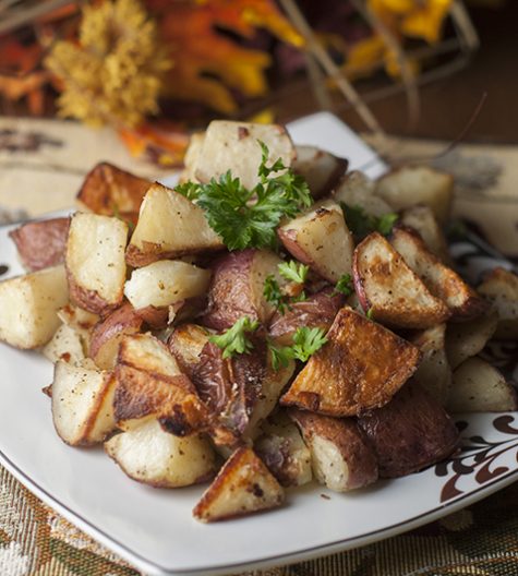 Italian Garlic Oven Roasted Potatoes are an easy go-to side dish for the holidays or any family meal and are the only roasted potato recipe you'll ever need to know!