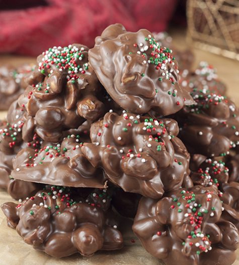 Crock Pot Triple Chocolate Peanut Candy dessert recipe is the easiest way to make homemade candy for the holidays! For this sweet and salty treat, just dump everything in the slow cooker and watch the magic happen!