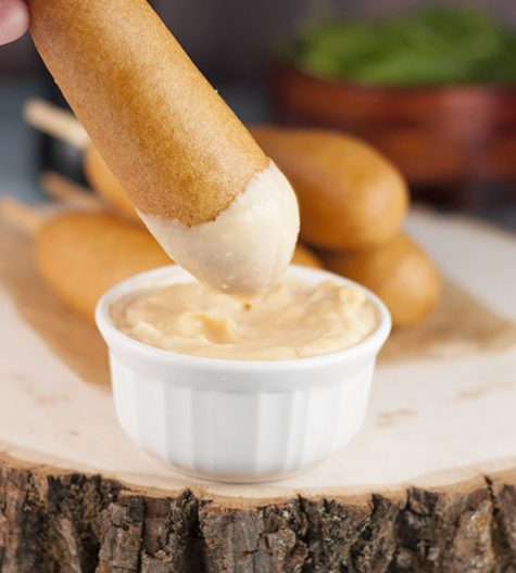 Skip the store-bought frozen snacks and make this recipe for Homemade Chicken Sausage Corn Dogs that are perfect for a party or have them for dinner! They are a real crowd pleaser!
