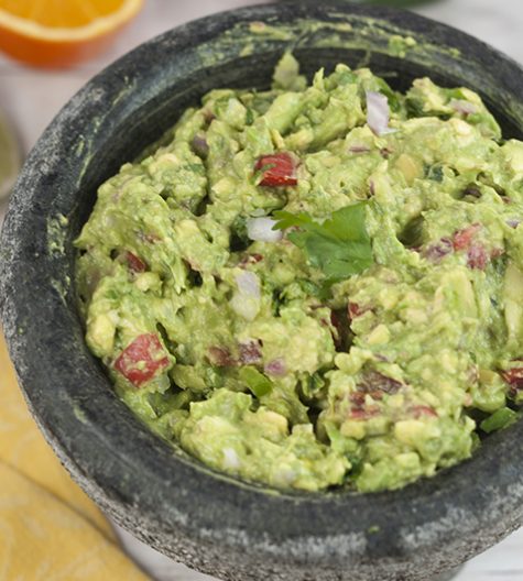 Cinco de Mayo is coming and I'm showing you how to make the best Homemade Ultimate Guacamole recipe that you'll ever have! I learned how to make it using fresh orange juice from a restaurant in San Antonio.