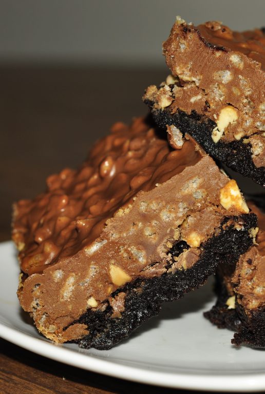 This dessert recipe for peanut butter cup crunch brownie bars will satisfy your chocolate and peanut butter craving!  It is made with a boxed brownie mix.