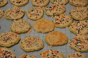 Double Pumpkin Cut-Out Cookies recipe is spiced pumpkin cookies topped with a traditional royal icing and perfect for fall or Halloween!