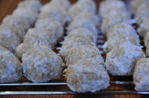 Fast and easy Walnut Snowball Cookies, or "Mexican Wedding Cookies", are a delicious nutty holiday dessert recipe for a crowd! These are the perfect Christmas cookie exchange idea!