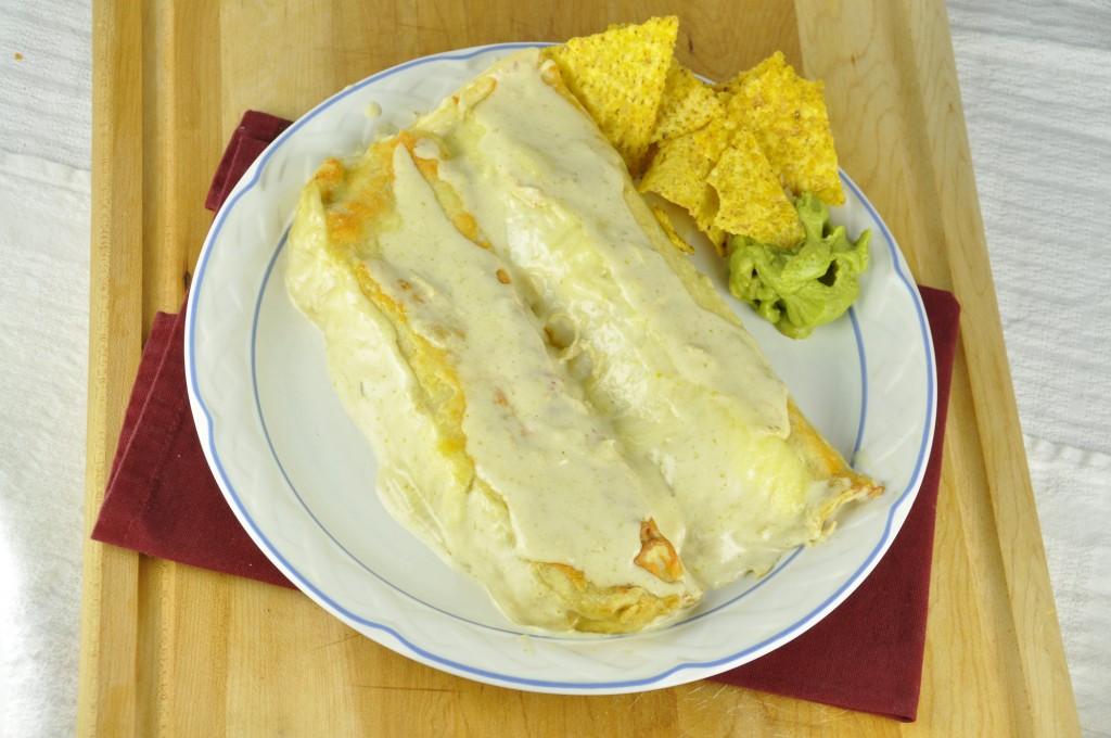 Honey Lime Chicken Enchiladas for Cinco de Mayo with a side of chips and guacamole