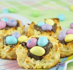 This is a quick and easy Easter dessert recipe for coconut macaroons filled with Nutella and topped with peanut M&M's to look like a bird's nest and eggs.
