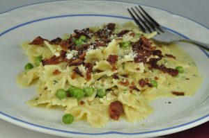 Classic Italian Creamy Pasta and Bacon Carbonara recipe is creamy, cheesy, and tastes like it's straight out of a restaurant!