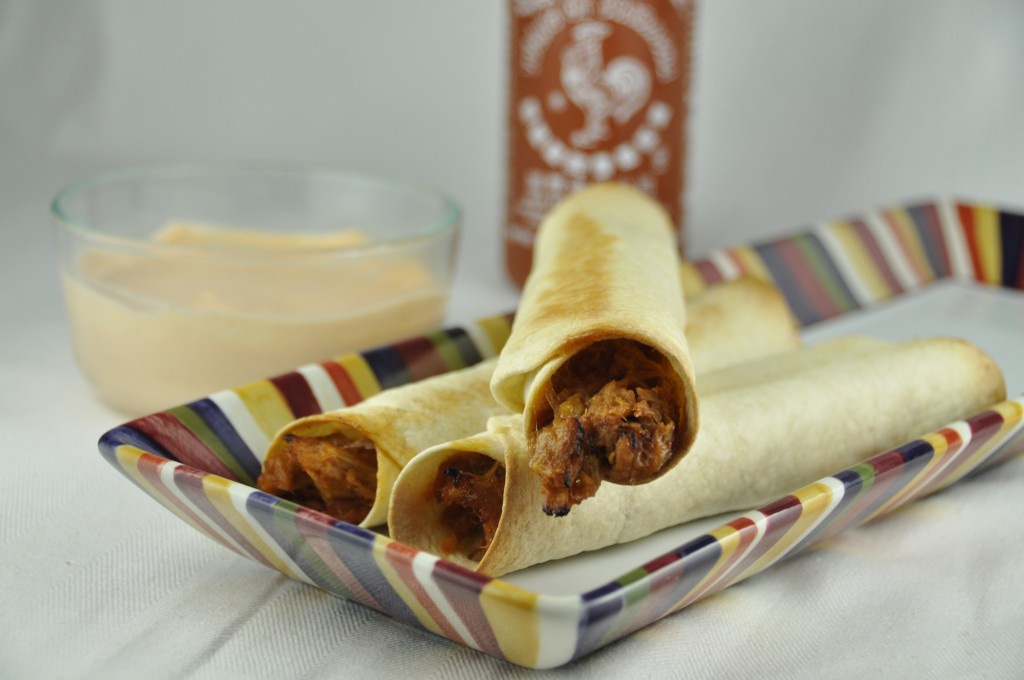 Baked Pork Flautas made in flour tortillas using leftover pulled pork