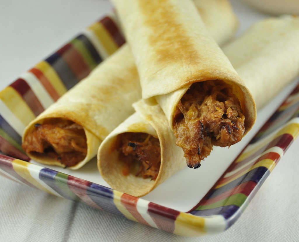 Baked Pork Flautas in flour tortillas using leftover pulled pork