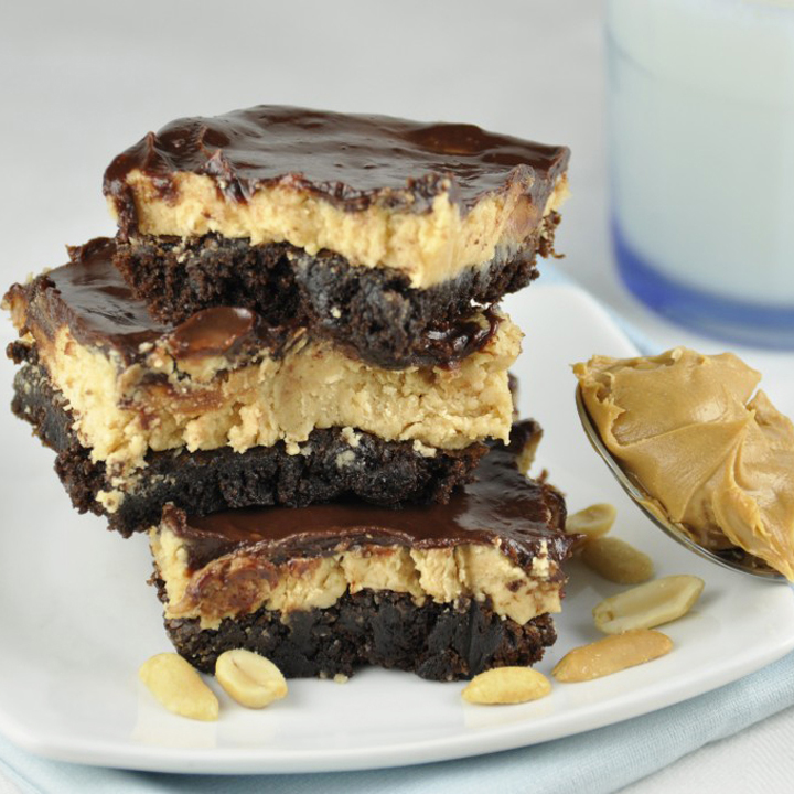 This recipe for Buckeye Brownies is the most amazing brownie you will ever taste: loaded with peanut butter, gooey chocolate, and layers of deliciousness.