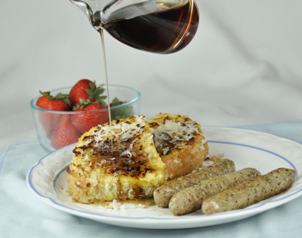 Coconut Crusted French Toast recipe with strawberries and chicken breakfast sausage.