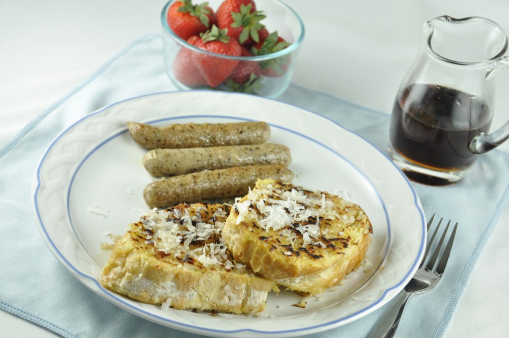 Easy Coconut Crusted French Toast is a tasty weekend breakfast recipe. Toasted coconut flakes and warm maple syrup make this the ultimate sweet breakfast indulgence! 