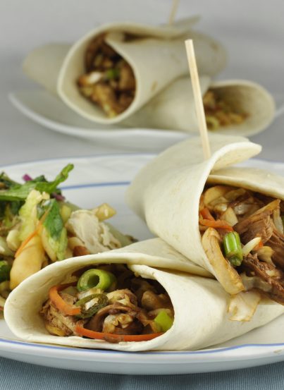 Asian Chicken Wraps in flour tortillas. Served with Chinese Chicken Salad. Delicious and easy!
