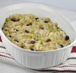 Homemade Bread Stuffing Recipe for Thanksgiving with craisins, onions, celery and poultry seasoning. Perfect for a smaller turkey!