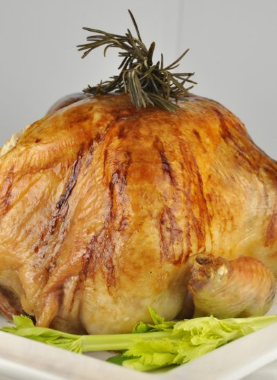 Thanksgiving Turkey Recipe stuffed with rosemary, sage, apple, onion and cinnamon stick. Great for any holiday!