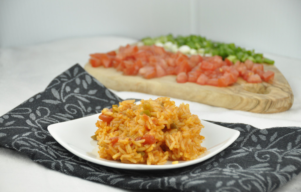 This Perfect Mexican Rice recipe is popular for a reason! It is way better than the rice from a box and is so easy to make!
