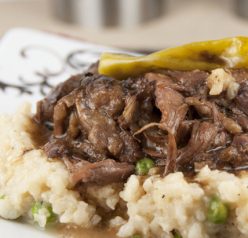 Crock Pot Mississippi Pot roast is so tender it will just fall apart as it cooks! The whole family will love this dinner recipe.
