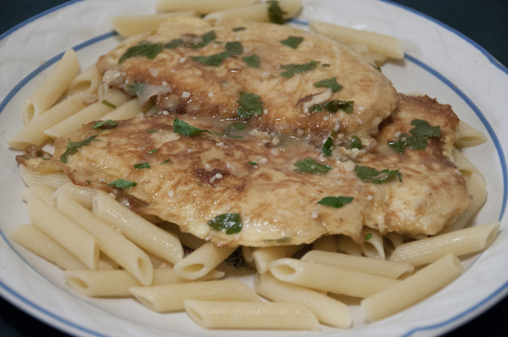 Chicken French Recipe (Chicken Frances).  Lemon butter wine sauce.  Served over pasta.