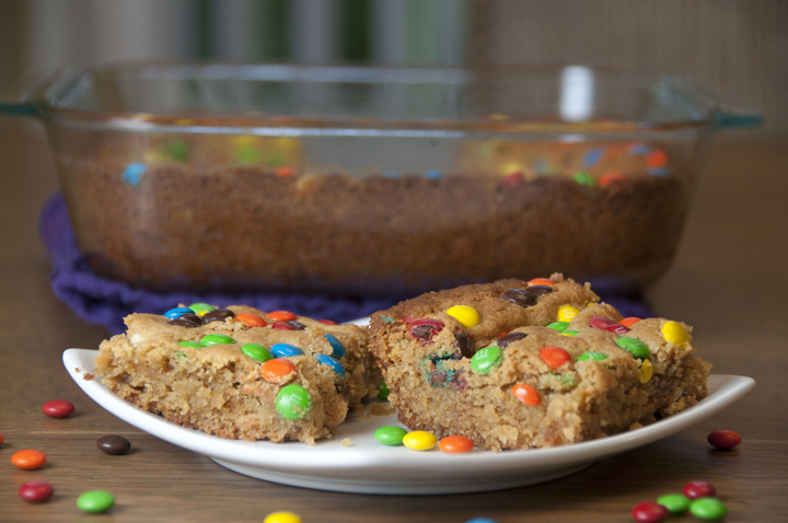 A combination of a chewy blondie and moist butter cake, these White Chocolate, Peanut Butter M&M Blondies are studded with white chocolate chips, peanut butter, and mini M&M's!