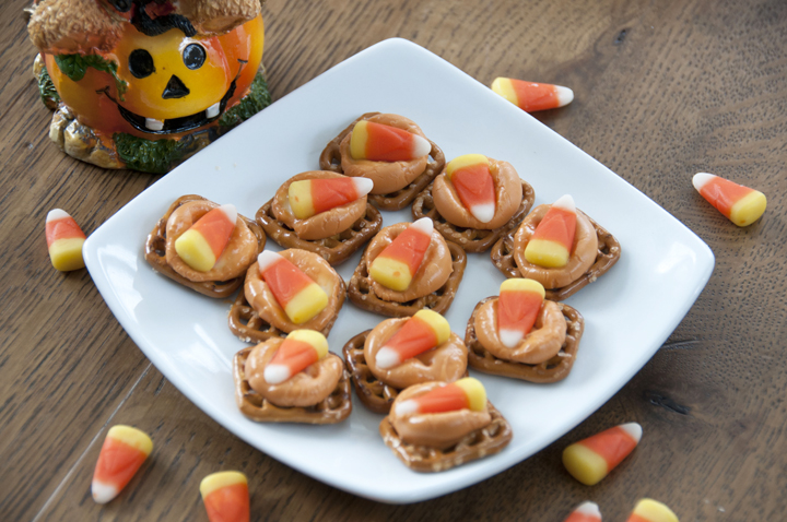Candy Corn Pretzel Bites Recipe for Halloween or Fall. I used Hershey's Pumpkin Spice Kisses.