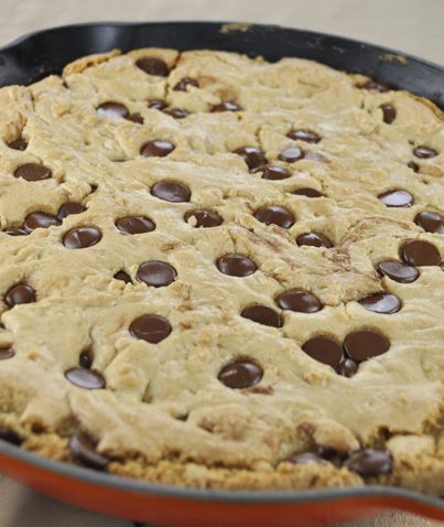 Dark Chocolate Chip Skillet Cookie Recipe. A giant chocolate chip cookie that is perfect to serve to company or dinner guests.
