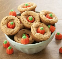 Peanut Butter Candy Corn Cookie Cups Recipe. I used the pumpkin candy corn - perfect for a Halloween party!