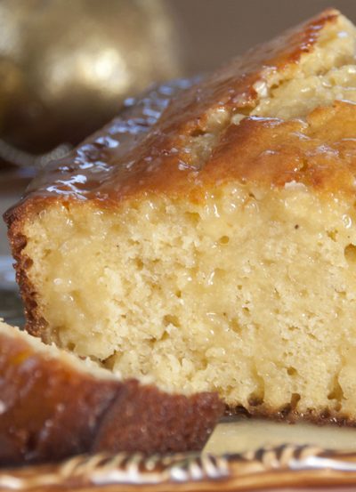 This Orange-Glazed eggnog bread recipe is a moist bread with a sweet orange eggnog glaze is a delicious dessert served with coffee or for Christmas breakfast!