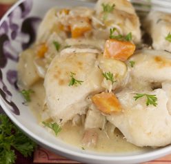 Creamy, comforting chicken and dumplings recipe made in the crock pot that couldn't be easier to make.  Just throw everything in your slow cooker and dinner is ready!