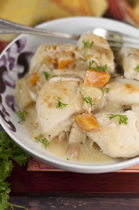 Creamy, comforting chicken and dumplings recipe made in the crock pot that couldn't be easier to make.  Just throw everything in your slow cooker and dinner is ready!