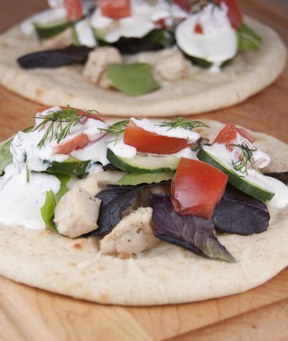 Grilled Greek Chicken Pitas with Tzatziki Sauce. Easy recipe for summer grilling.
