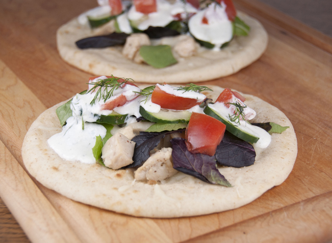Grilled Greek Chicken Pitas with Tzatziki Sauce.  Easy recipe for summer grilling.