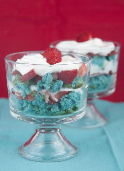 This is a recipe for an incredibly simple and festive red, white and blue 4th of July mini trifle dessert with fresh strawberries.