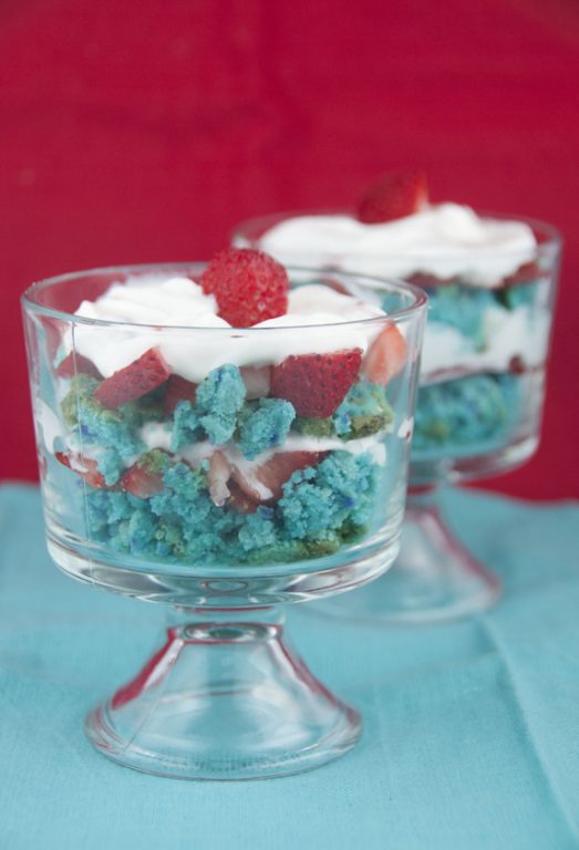 This is a dessert recipe for an incredibly simple and festive red, white and blue mini 4th of July Strawberry Trifles made with fresh strawberries! These would also be perfect for Memorial Day!