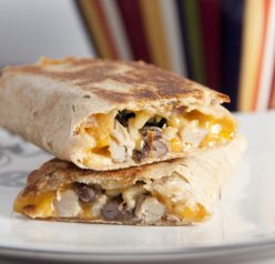 Crispy Southwest Chicken Wraps couldn't be easier to put together and are absolutely delicious with peppers, black beans and cheddar cheese. Great lunch or dinner recipe.