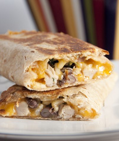 Crispy Southwest Chicken Wraps couldn't be easier to put together and are absolutely delicious with peppers, black beans and cheddar cheese. Great lunch or dinner recipe.