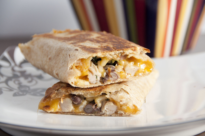 Crispy Southwest Chicken Wraps couldn't be easier to put together and are absolutely delicious with peppers, black beans and cheddar cheese.  Great lunch or dinner recipe.